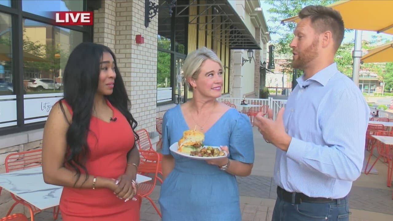 reporter interviewing Anna and Sam