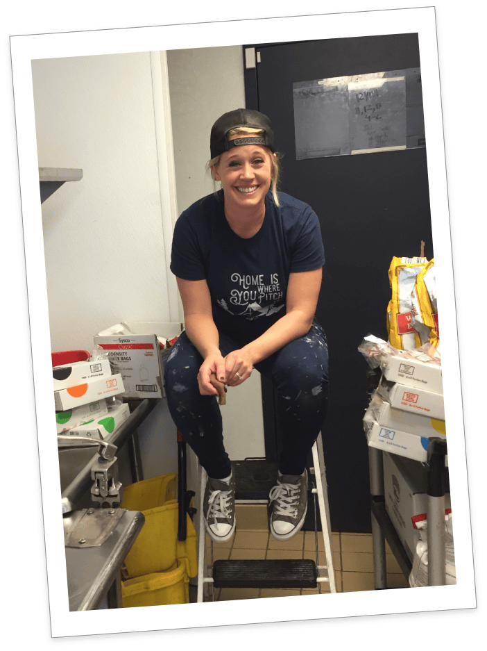 Anna sitting on a step stool