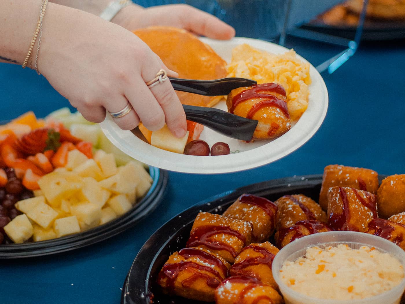 woman making breakfast plate